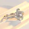 Anillo de amor giratorio índice dedo simple moda anillo personalidad diamante hierba de la suerte anillo abierto joyería de plata al por mayor