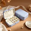 Caja de joyería portátil directa de fábrica con espejo, caja de joyería de lujo de alta gama, caja de almacenamiento de pulsera de cristal, collar, pendientes al por mayor