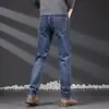 Jeans Masculino Loose Tamanho Grande Stretch Durável Resistente ao Desgaste Loose Reto Tendência Versátil para Primavera e Outono 2024
