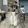 Pantalones de Mezclilla con Parches de Leopardo Remaches Estilo Americano High Street para Hombre Otoño Marca de Tendencia Street Hip Hop Pantalones Holgados de Pierna Ancha