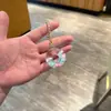 Chaveiro de acrílico transparente com areia movediça de desenho animado, pingente de bolsa, pequeno presente para crianças, decoração de carro