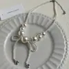 Collar de Perlas con Lazo Pequeño Estilo Chanel Cadena para Clavícula con Borla Estrella Corazón Moda Sentido del Diseño de Nicho