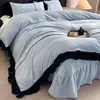 Juego de ropa de cama de cuatro piezas estilo francés de lujo ligero, bordado de alto gramaje en terciopelo de leche, amigable con la piel, cálido, franela engrosada, artículos para dormitorio