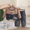 Conjunto de ropa infantil para niño 2026 nuevo elegante para bebé primavera y otoño bonito sudadera de manga larga conjunto de dos piezas para venta al por mayor