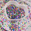 Lentejuelas de colores mezclados de gran venta, lentejuelas de arte de uñas de estrella hueca de cinco puntas, material de bricolaje, relleno de cáñamo de flujo, película de color de PVC
