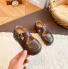 Zapatos de Cuero Pequeños Estilo Británico 2026 Nuevos de Cruz con Velcro Versión Coreana Suela Suave Antideslizantes Mary Janes Zapatos para Bebés Niños