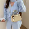 Bolso Retro de Gama Alta para Mujer 2026 Nueva Moda Urbano Sencillo Empalmado Versátil Bolso Cubo de Hombro Cruzado