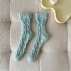 Calcetines de felpa de coral para otoño e invierno sin pelusa, venta al por mayor de fábrica, alta elasticidad, trenzados, engrosados, antideslizantes, cálidos, para el suelo del hogar