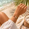 Pulsera para mujer con cuentas blancas, negras y doradas, redonda, geométrica, simple, para el día a día, otoño 2025, 16.5 cm