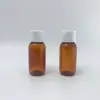 Frasco de amostra translúcido marrom de 50ml com tampa flip-top, ombro arredondado e fundo arredondado, para shampoo, condicionador, loção, tamanho de teste, frasco reutilizável