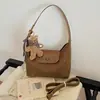 Bolso de axila para mujer, nueva colección invierno 2026, bolso estilo baguette para commuting, diseño único, bolso de hombro versátil, bolso cruzado