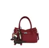 Bolso de mano tipo dumpling simple y moderno 2026 verano nueva moda bolso cruzado para mujer de uso diario bolso de hombro personalizado casual para mujer