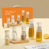 Juego de Botes de Aceite y Frascos de Condimentos Qixiang Botella Creativa para el Hogar de Salsa de Soja y Vinagre Botella de Condimentos Regalo para Eventos Venta al por Mayor Compra Grupal Regalo