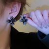 Pendientes grandes con diseño de flor negra exagerada para mujer, de alta gama, con un nuevo diseño de moda, estilo francés de nicho.