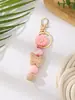 Llavero de Silicona con Cuentas Transfronterizo con Pequeños Accesorios de Margarita, Pulsera de Madera con Mariposas de Moda, Colgante de Llavero con Borla Corta