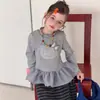 Conjunto de Niña 2026 Otoño Nuevo Estilo: Conjunto de Dos Piezas: Camiseta de Manga Larga con Bordado de Gatito 3D y Lazo y Pantalones de Pierna Ancha a Rayas
