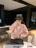 Suéter de punto con cuello en V a rayas estilo coreano, casual y versátil, con un toque relajado y sofisticado, corte holgado, colores contrastantes, top de punto rosa