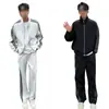 Outono 2026 Conjunto de Duas Peças com Capuz e Zíper Três Listras Masculino e Feminino Luxo Leve Estilo de Rua Conjunto Casual de Moda