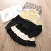 Ropa para Niños 2026 Primavera Estilo Coreano Suéter para Niños Blanco y Negro Tejido de Lana Cárdigan Traje de Falda Tejida para Niños