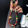 Corrente de Celular de Contas Ano Novo Estilo Chinês Festivo Lingote de Liga Saco da Sorte Corrente Pendente Contas de Cristal Cordão para Celular Mulheres Atacado