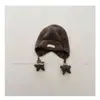 Chapéu de Lã Unissex para Crianças Inverno 2026 Novo Estilo Cor Sólida com Abas de Orelha À Prova de Vento Quente para Estilizar com um Gorro