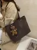 Bolsa Tote Tecida Texturizada Retrô Feminina 2026 Nova Moda para o Dia a Dia Bolsa de Ombro Único Sob o Braço Simples de Grande Capacidade Bolsa Feminina