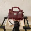 2026 Nuevo Bolso de Mano con Asa de Cadena Tejida de Lujo, Bolso de Hombro Cruzado de Gama Alta de Nicho para Mujer
