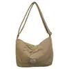 Bolso acolchado de color liso estilo coreano para mujer 2026 Otoño/Invierno Nuevo Tejido de nailon Gran capacidad Ligero para ir al trabajo Bolso de hombro único Cruzado para mujer