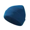 Gorro de punto transfronterizo más vendido para mujer, gorro cálido de invierno para ciclismo con protección para las orejas, gorro de punto a prueba de viento de lana para hombre, al por mayor en stock