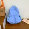 Nova mochila de nylon colorida tipo macaron 2026 para mulheres, leve, pode ser usada como bolsa de viagem ou mochila escolar para estudantes do ensino fundamental