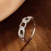 Anillo de cadena simple de personalidad de moda coreana, anillo de circón, diseño pequeño lindo versátil para mujer, ventas directas de fábrica de joyería