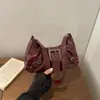 Bolsa de motocicleta vintage estilo coreano transfronteiriça para garotas estilosas, adequada para moda de rua e deslocamento, bolsa de ombro vintage sob o braço