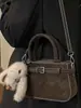 Bolsa de Mão Estilo Western Retrô de Nicho Novo Estilo Inverno 2025 Bolsa Transversal Personalizada Bolsa de Ombro Fashion Simples Tendência