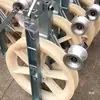 Polea, polea de doble propósito para colgar y colocar, polea de nylon galvanizado con borde envuelto, herramienta para tendido de líneas de construcción eléctrica