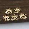 Acessórios de joias antigos cor de cobre fundido dourado pingente oco borla pingente pequeno material para grampo de cabelo 13*13mm