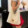 Bolso de mujer estilo casual 2026 nuevo verano súper popular tejido para vacaciones bandolera bolsa de mano para ir al trabajo de gran capacidad