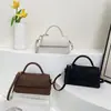Bolso Casual tipo Baguette de Mano para Mujer 2025 Otoño Nuevo Lujo Accesible Color Contrastante Textura de Alta Calidad Bolso de Hombro Único Cruzado