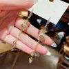 Pendientes largos de bolsa de dinero 2022 Nuevos Pendientes de borla de alto sentido pendientes pendientes de pin de plata de ley pendientes finos de moda cara mujeres