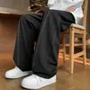 Calça Casual Masculina de Seda Gelada Estilo Novo Verão 2026 com Costura Visível e Design Curvo, Tendência Solta Emagrecedora para Comércio Exterior