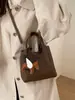 Bolsa Transversal de Ombro Único Estilo Novo Inverno 2026, Textura Simples e Fashion, Design de Nicho, Bolsa Saco Casual Feminina