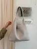 Bolsa de palha tecida transfronteiriça nova, item de venda quente, design minimalista e único, bolsa de ombro, bolsa de ombro de grande capacidade