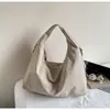 Bolsa de tela para axila de gran capacidad para mujer 2026 Nueva moda Casual Diseño de nicho Bolso de hombro Bolso tote simple y único
