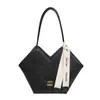 Bolso de mujer de moda 2026 nuevo modelo nicho francés casual coreano versión moda para ir al trabajo bolso de hombro bolso de mano bolso tote
