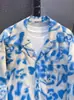 Camisa de Praia Floral Azul de Verão Estilo Sanya Hawaii Férias Preguiçosa Retro Solta Camisa para Casal