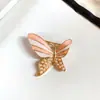 Nuevo al por mayor vintage moda nacional exquisito mariposa gota de aceite esmalte perla broche pin de plata 925 pendientes traje