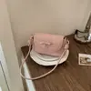 Elegante y versátil popular bolso de hombro con lazo, nuevo bolso cruzado de moda de verano 2026 para el trabajo con un aire casual