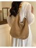 Bolsa de tecido casual de grande capacidade transfronteiriça Nova bolsa de ombro oca tecida à mão Bolsa de praia de férias Bolsa feminina para todos os jogos