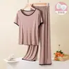2026 Nuevo Modelo 8 Colores Color Sólido con Copas Acolchadas Dulce Casual Manga Corta Shorts Conjunto de Pijama de Verano para Mujer Ropa de Casa