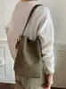 Bolso grande de mujer vintage para otoño e invierno 2026 nuevo diseño de moda patrón tejido de un solo hombro bolso madre-hija bolso cubo para el día a día