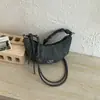 Bolsa feminina de nicho da moda, nova bolsa de ombro popular de moda verão 2026, bolsa de bolinho, bolsa transversal tipo chifre